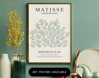 May include: A framed art print featuring a green and white abstract design by Henri Matisse. The print is titled "Papiers Découpés" and includes the text "BERGGRUEN & CIE 70, RUE DE L'UNIVERSITÉ, PARIS-VII Du Vendredi 27 Février au Samedi 28 Mars 1953" and "ART POSTERS AVAİLABLE".
