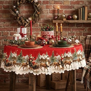 May include: A round tablecloth featuring a red base with a white winter scene of Santa Claus in a sleigh pulled by reindeer, set on a wooden table with a place setting of bowls, plates, candles, and a wreath against a brick wall background.
