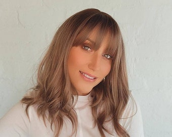 SWEET AS SUGAR 16” Premium Heat-resistant Fibre Wig. Soft mousey brown wavy with bangs. Sm-Lge Cap