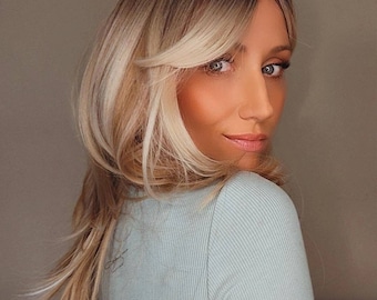 BANGIN&#39; BABE 16&quot; Premium Heat-resistant Fibre Wig&#39;. Adjustable small to large cap. Blonde with dark blonde root melt. 130% density
