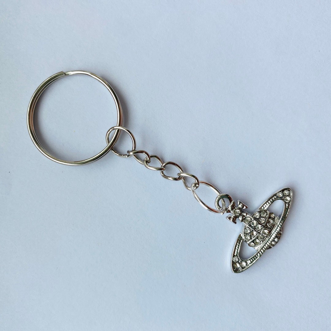 silver Saturn key ring. VW key chain. Planet earth orb key ring. Christmas gift. Holiday gift. Stocking filler