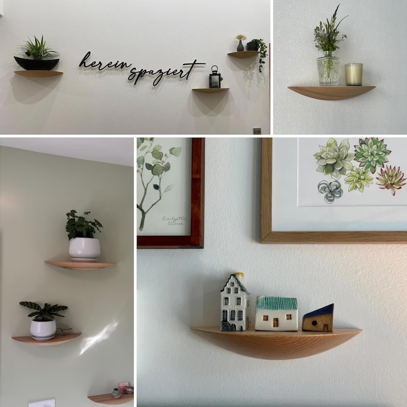 May include: A collection of wooden floating shelves, each holding decorative items like plants, miniature houses, and framed artwork. The shelves are mounted on a white and green wall, creating a minimalist aesthetic.