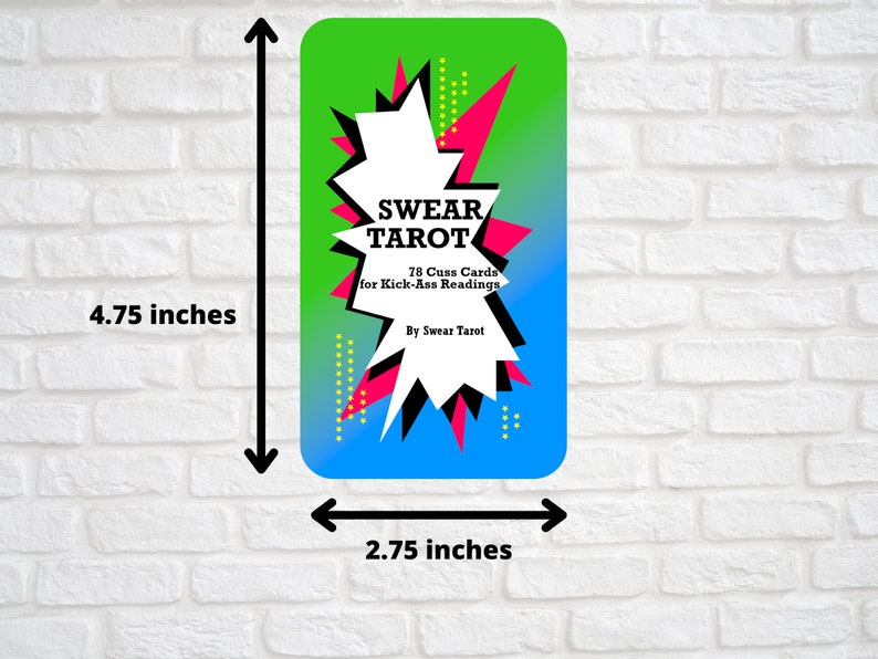 May include: A green, pink and blue tarot card with a black and white starburst design. The card reads "SWEAR TAROT" and "78 Cuss Cards for Kick-Ass Readings, By Swear Tarot".