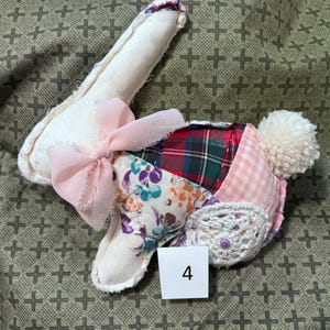 Handmade quilted bunnies made from vintage quilts and textiles. 4