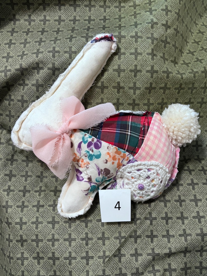 Handmade quilted bunnies made from vintage quilts and textiles. 4