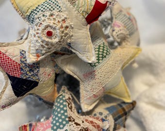 Quilted stars-bowl fillers or ornaments.  Made from vintage and repurposed quilts.