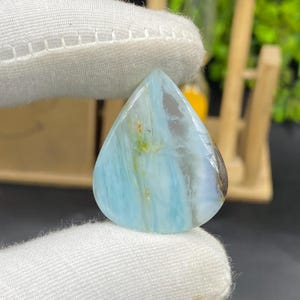 Bright Blue Peruvian Opal Cabochon: Rare Gemstone for Jewelry (29x23x4 mm, 19.55 ct)