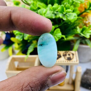 AAA+ Blue Peruvian Opal Cabochon: Oval Semi Precious Gemstone (25x14x5 MM)