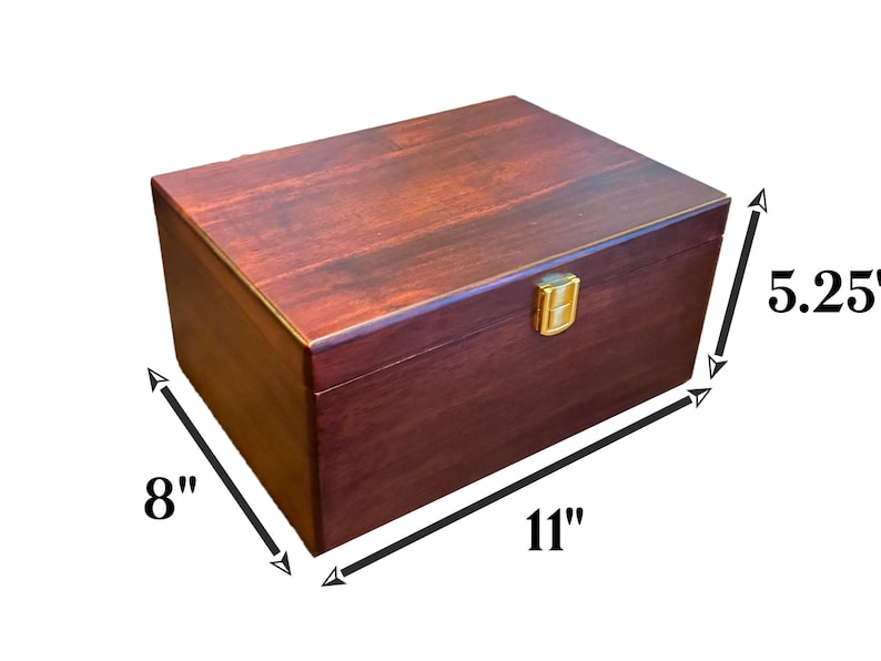 May include: A dark red wooden box with a gold latch. The box measures 11 inches long, 8 inches wide, and 5.25 inches tall.