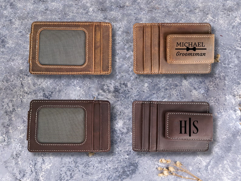 May include: Four brown leather wallets with a money clip. Two wallets have a window for a photo ID. One wallet has the text "MICHAEL Groomman" and a bowtie. One wallet has the initials "H|S".