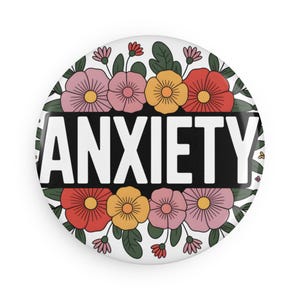 Imán redondo con forma de botón floral para la ansiedad