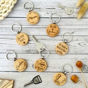 Round wooden keyring with personalized text