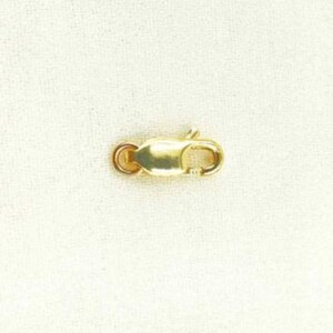 Zapięcie typu homar wykonane z litego żółtego złota 14K o średnicy 7 mm, z blokadą jubilerską. 0014LC00WR14KY zdjęcie 5