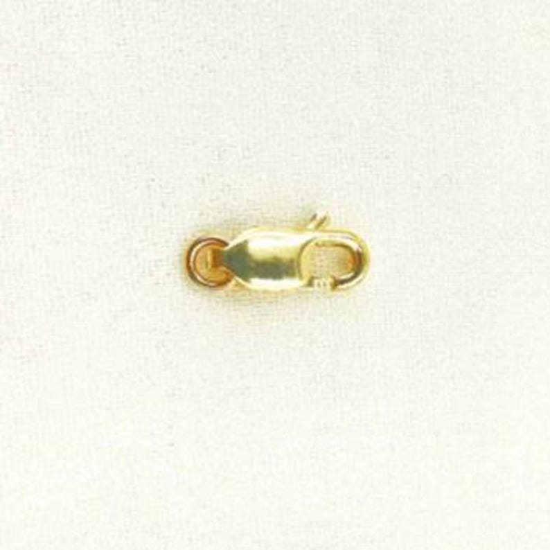 Zapięcie typu homar wykonane z litego żółtego złota 14K o średnicy 7 mm, z blokadą jubilerską. 0014LC00WR14KY zdjęcie 5