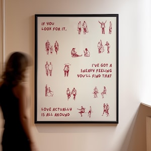 Puede incluir: Impresi&oacute;n art&iacute;stica enmarcada con borde negro. La impresi&oacute;n presenta ilustraciones rojas de personas en varias poses, con el texto "IF YOU LOOK FOR IT", "I'VE GOT A SNEAKY FEELING YOU'LL FIND THAT" y "LOVE ACTUALLY IS ALL AROUND."