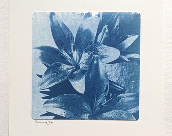 This handmade cyanotype is an original work of art of two tiger lily flowers.