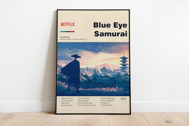 May include: A poster for the Netflix series "Blue Eye Samurai" featuring a man in a black robe walking through a Japanese village. The poster has a blue, pink, and orange color scheme and the text "NETFLIX" in red and white.