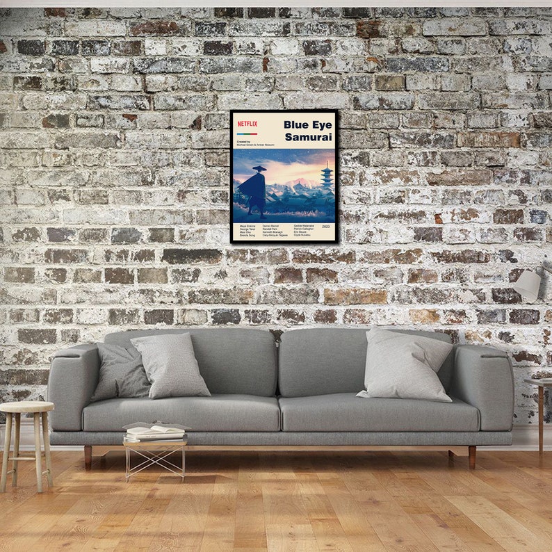 May include: A poster for the Netflix film "Blue Eye Samurai" featuring a silhouette of a samurai in a blue and white landscape. The poster has a vintage look with a red, white, and blue Netflix logo.