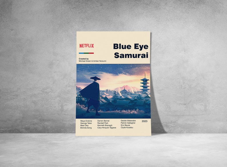 May include: A poster for the Netflix series "Blue Eye Samurai" featuring a man in a black robe walking through a Japanese village. The poster has a sunset background with a pagoda in the distance. The text "NETFLIX" is at the top of the poster, and the text "Created by Michael Green & Amber Noizumi" is below it.