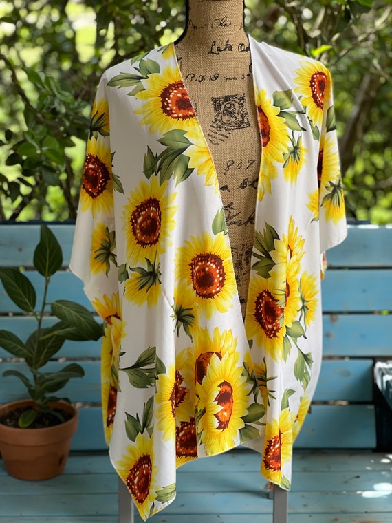 Blusas transparentes de girasoles sale