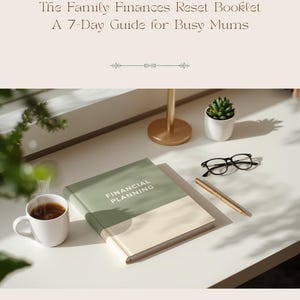 May include: A hardcover booklet titled "FINANCIAL PLANNING" with a green and cream cover sits on a white desk. The text "The Family Finances Reset Booklet A 7-Day Guide for Busy Mums" is at the top. A cup of coffee, glasses, and a pen are also on the desk.