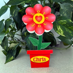 Cartão de felicitações de dia dos namorados com flor eu te amo