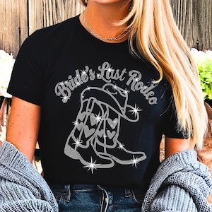 Bride&#39;s Last Rodeo with Boots Rhinestone T-Shirt, Western Bachelorette Merch, Cowgirl Bride Wedding gift, Western Bridal Party Shirt