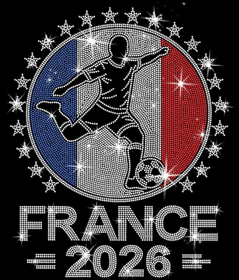 May include: “France 2026” soccer design. The artwork includes a soccer player silhouette layered over a French flag inspired background with sparkling star accents surrounding the circular design. Royal blue, red, and silver rhinestones are used throughout the graphic.