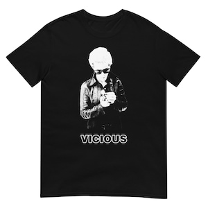 May include: Black t-shirt with a white image of a person wearing sunglasses and a leather jacket. The text "VICIOUS" is printed in white below the image.