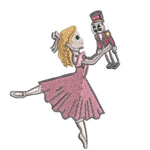 Può includere: Una ballerina con un vestito rosa tiene un soldato giocattolo nella sua mano destra. La ballerina indossa collant bianchi e scarpe bianche. Il soldato giocattolo indossa un'uniforme rossa e blu.