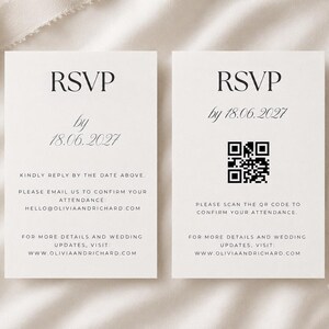 May include: Two white rectangular RSVP cards with black text. The left card reads RSVP by 18.06.2027, kindly reply by the date above, please email us to confirm your attendance hello@oliviaandrichard.com, and visit www.oliviaandrichard.com.