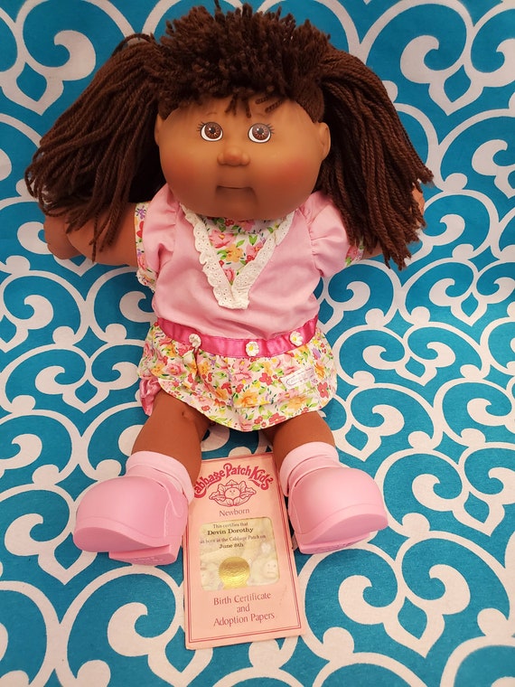 black cabbage patch logo