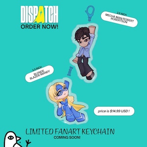 May include: Two 2.5 inch acrylic keychains featuring cartoon characters. One is Mecha Man/Robert Robertson with dark hair in a blue shirt and black pants. The other is Blonde Blazer/Mandy in a blue superhero suit with a yellow cape and mask.