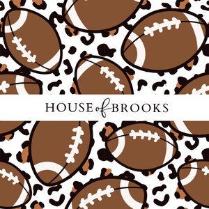 May include: A repeating pattern of brown American footballs with white laces and accents, set against a white background with black and brown leopard print spots. The text "HOUSE of BROOKS" is displayed in a black font.
