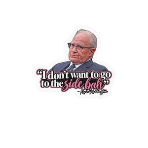 May include: A die-cut sticker featuring an older person with gray hair wearing glasses, a dark suit, and a patterned tie. Below the figure, the text reads: "I don't want to go to the side bah" in black and pink, followed by "- Kevin Reddington".