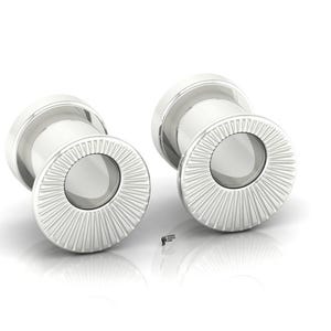 May include: A pair of silver-toned ear plugs featuring a cylindrical body and a flat, circular front face. The front face is decorated with a radial sunburst pattern of fine, etched lines surrounding a smooth, polished circular center.