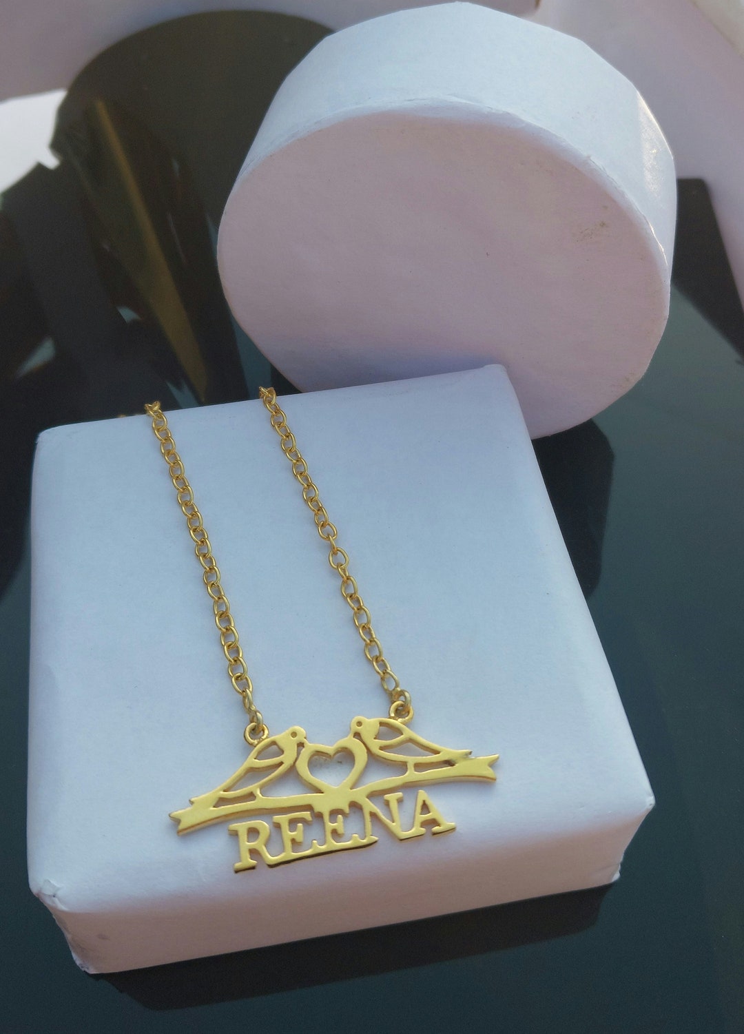 Reena on sale name locket