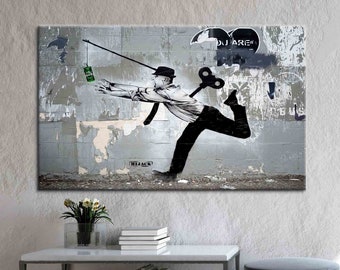 ハイジャックストリートアートキャンバス - お金を追いかける巻き上げ