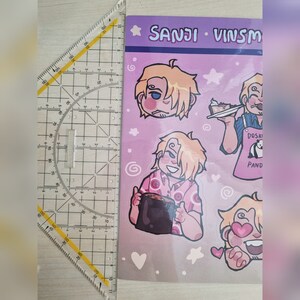 May include: A set of five stickers featuring a cartoon character with blonde hair. The character is shown in different poses, including holding a cup of coffee, a plate of food, and a panda bear. The stickers are printed on clear vinyl and have a glossy finish.