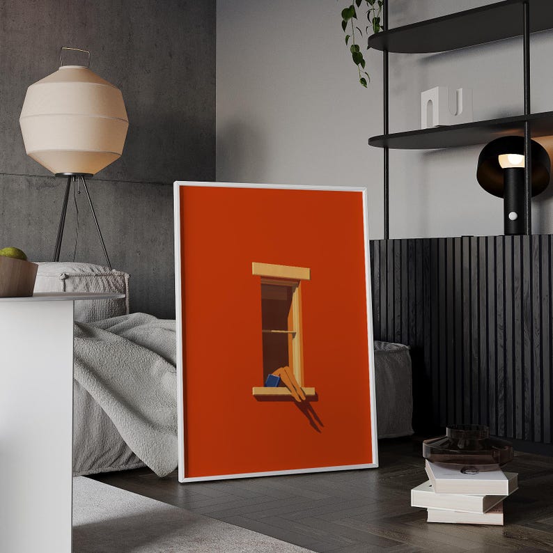 May include: A framed art print featuring a minimalist illustration. The artwork depicts a window set in a vibrant orange wall. Legs in blue shorts are visible in the window. The print is in a white frame.
