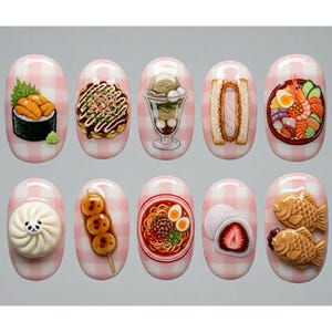 May include: A set of ten nail art designs featuring miniature Japanese food items. Each nail showcases a different dish, including sushi, ramen, and desserts, set against a pink and white checkered background. The designs are detailed and colorful.