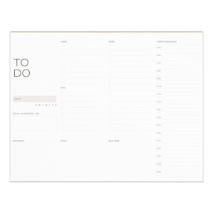 May include: A white daily planner desk pad featuring the text TO DO, a date field with days of the week, a gratitude section, and categorized lists for Home, Kids, and Work. The right side includes a Today's Schedule column from 5 AM to 8 PM.