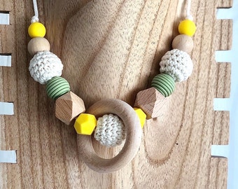 Breastfeeding and baby carrying collar with or without wooden ring, adjustable collar.