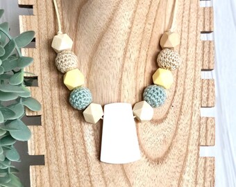 Breastfeeding necklace with water green, beige yellow beads