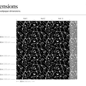 May include: A black and white wallpaper pattern with a repeating design of branches and birds. The wallpaper is shown in three rolls, each measuring 39 inches wide. The dimensions of the wallpaper are shown in inches and centimeters.