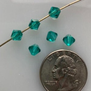 Vintage Czech crystals - 6 mm Teal Green bicones (8)