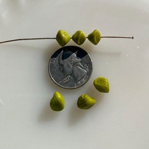 Vintage German Glass Beads -- 8 mm -- Avocado Green Asymmetrical Bicones (12)
