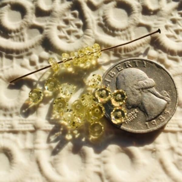 Pale Yellow Austrian glass faceted spacers -- 2 by 5 mm rondelles (20)