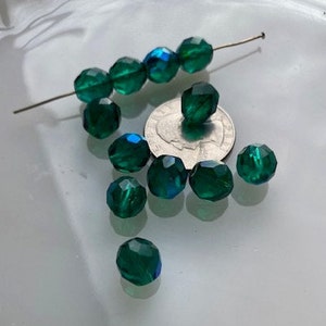 Vintage Czech Glass TOURMALINE GREEN 9 by 10 mm faceted rounds (8)