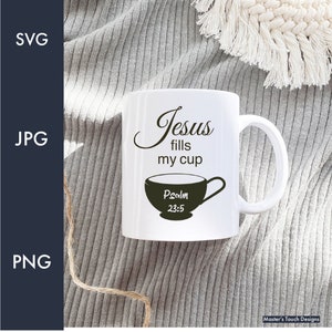 May include: White ceramic mug with a black design that says "Jesus fills my cup" and "Psalm 23:5". The mug has a black silhouette of a teacup with a handle.